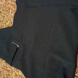 Green slacks with belt accent detail